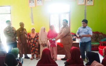 Pemerintah Tiyuh Pagar Dewa Bagikan BLT DD dan Bantuan Panganan Kepada Warga